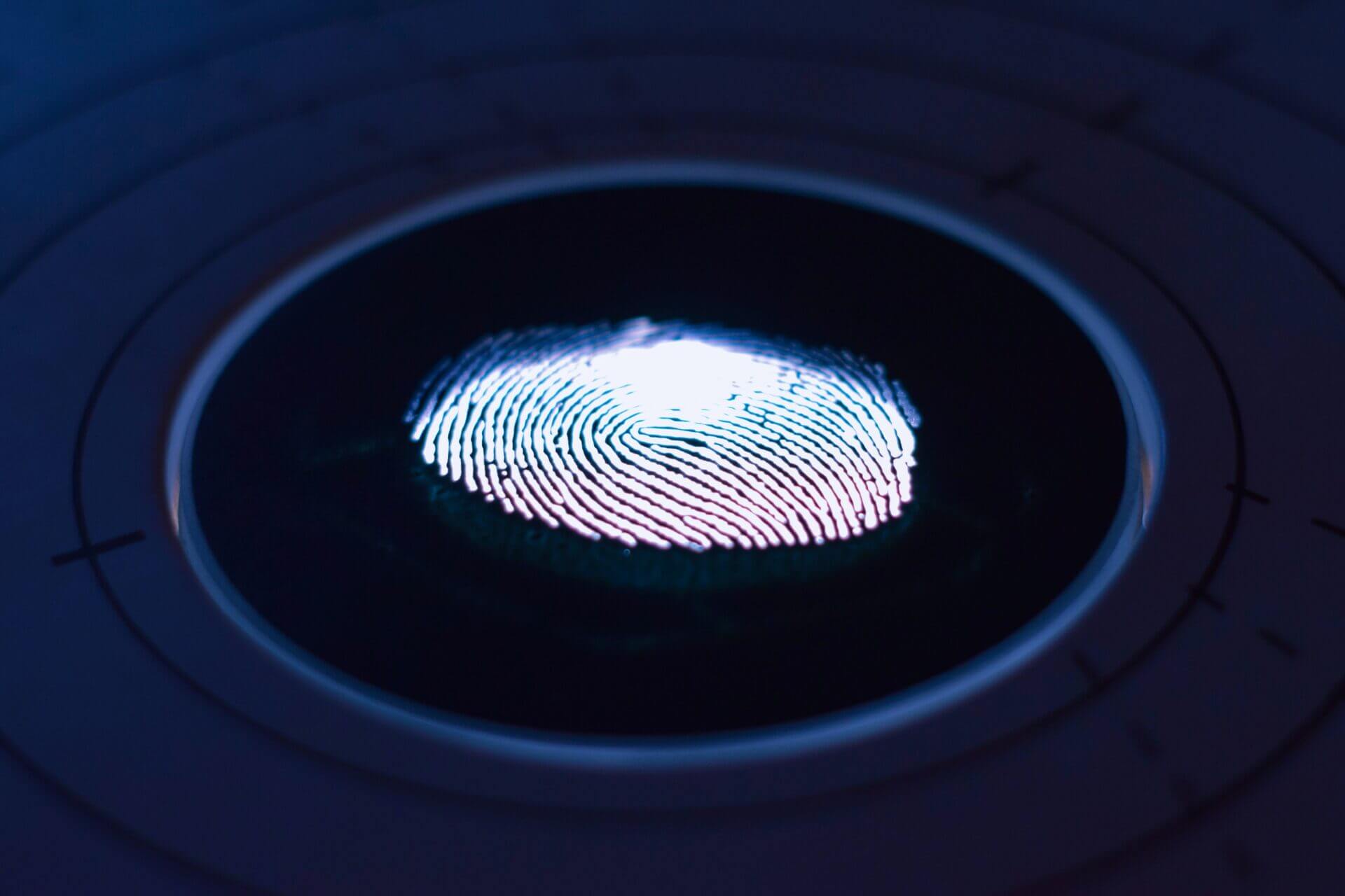 A person holding a phone, with a lock screen on it